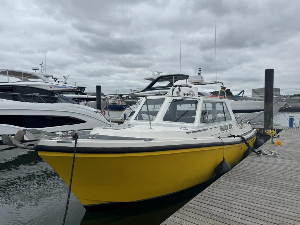 Universal Marine Plymouth Workboat Charter Charlie Boy Lochin 333 Alongside Pontoon Port Bow View